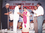 JAYABHASKAR BEING FELICITATED BY SHRI PADMANABHIAH